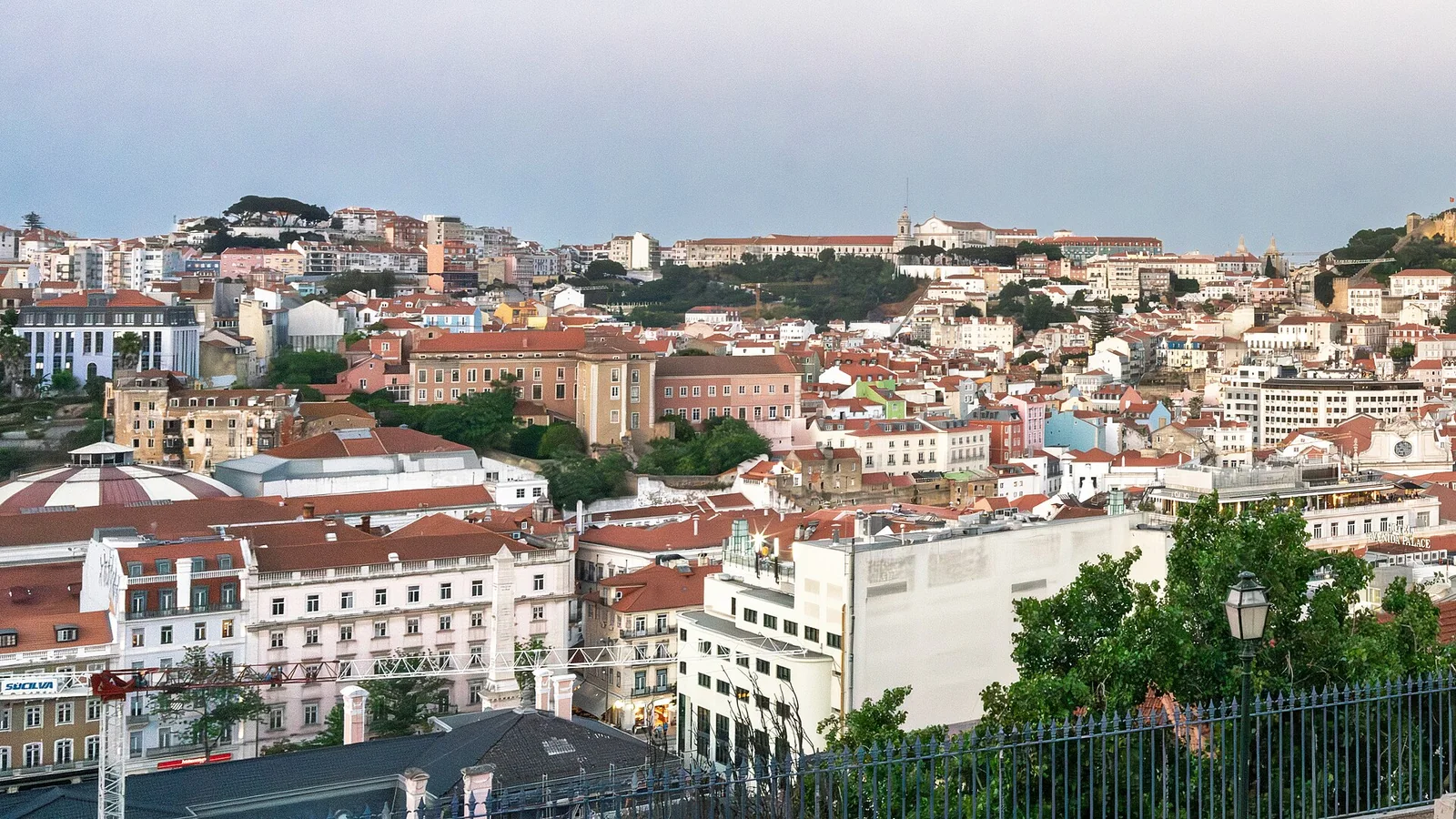 Lisbon rooftops and hills at dusk